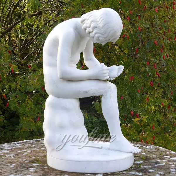 Boy with thorn statue