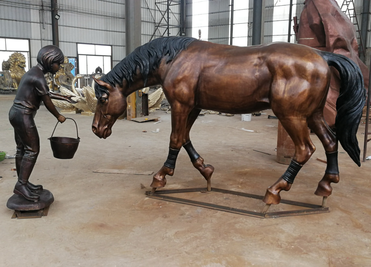 Girl Feeding a Horse