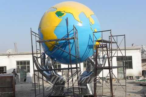 Outdoor-Abstract-Two-hands-hold-the-Earth-sculpture-in-stainless-steel-for-Sale