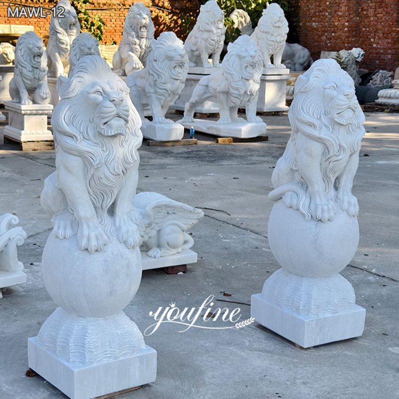 Pair of Sitting Lion Statues on Ball for sale