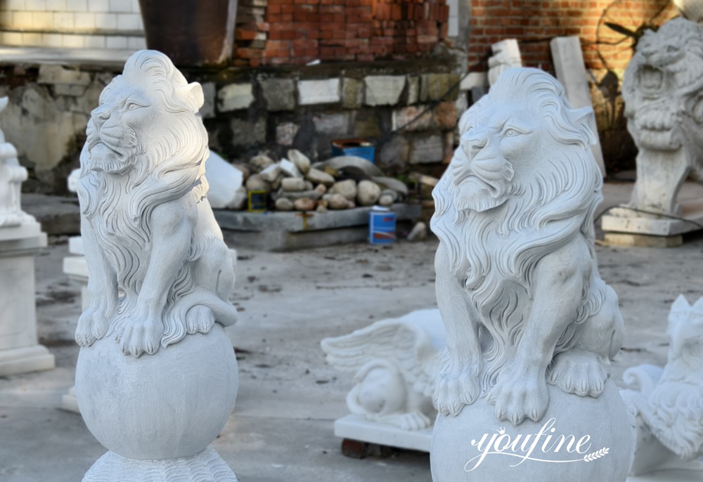 Pair of Sitting Lion Statues