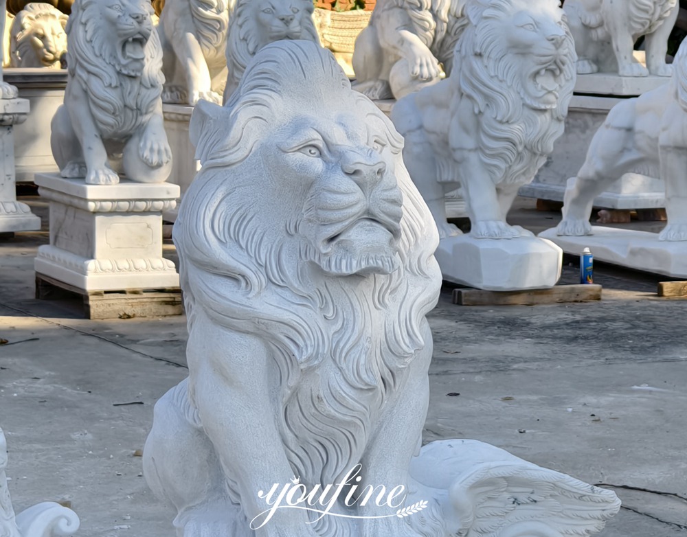 Pair of marble Sitting Lion Statues on Ball