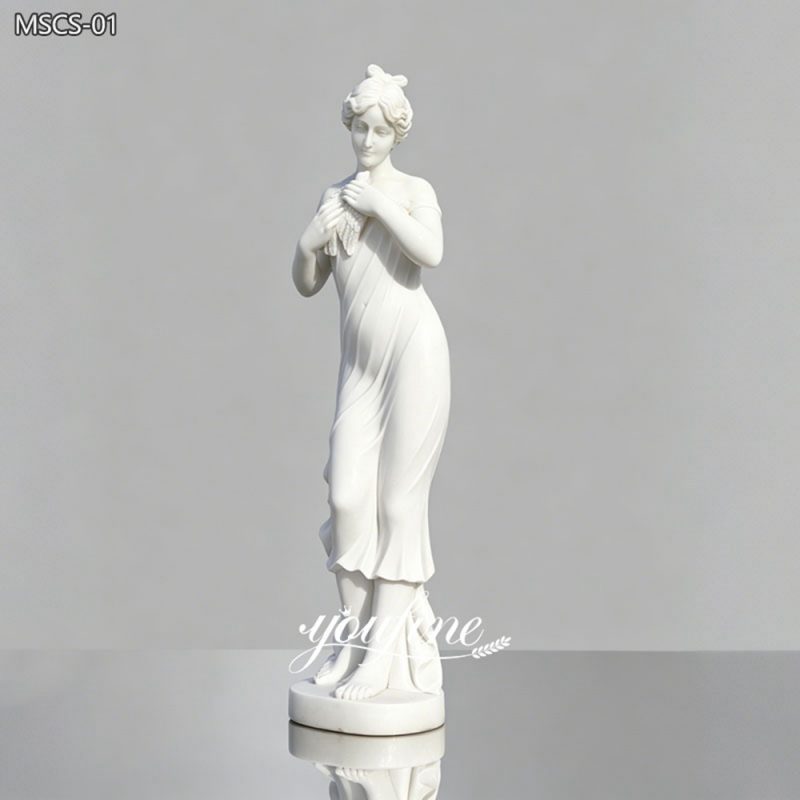 Veiled Woman with a Bird Statue