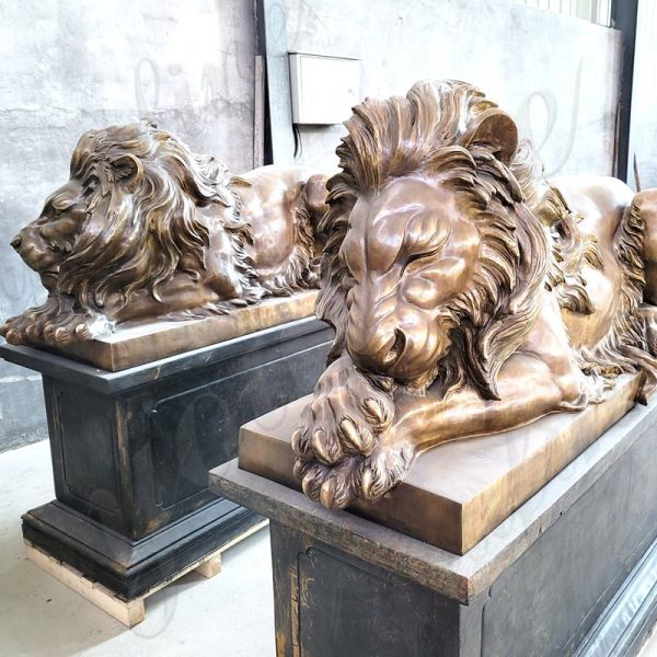 bronze laing lion statue