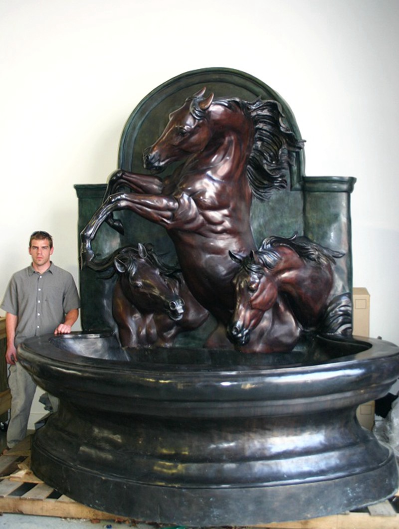 fountain with horses