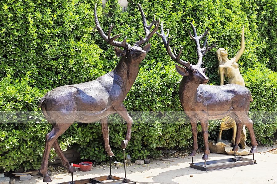 yard brass deer sculpture