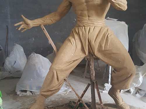 Large Bronze Sculpture with famous Figure Bruce Lee