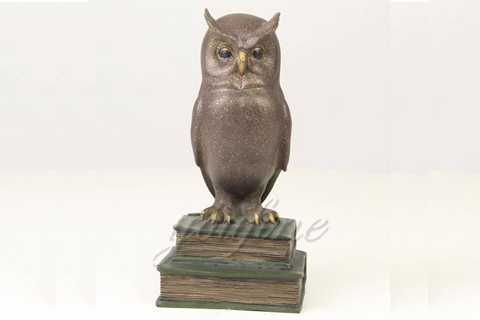 owl standing book statue