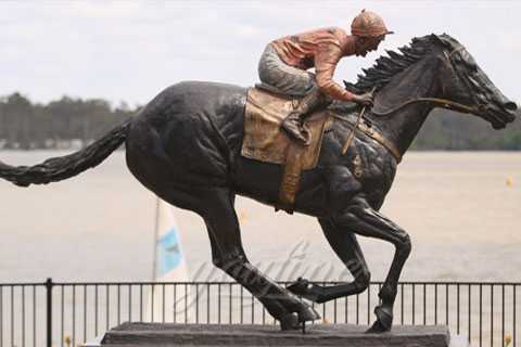 bronze sculpture of man riding horse