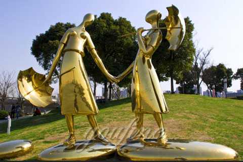 two golden figure Stainless Steel Sculpture