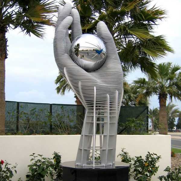 large grey resin outdoor sculpture