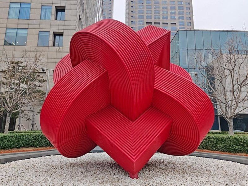 outdoor decorative red stainless steel sculpture