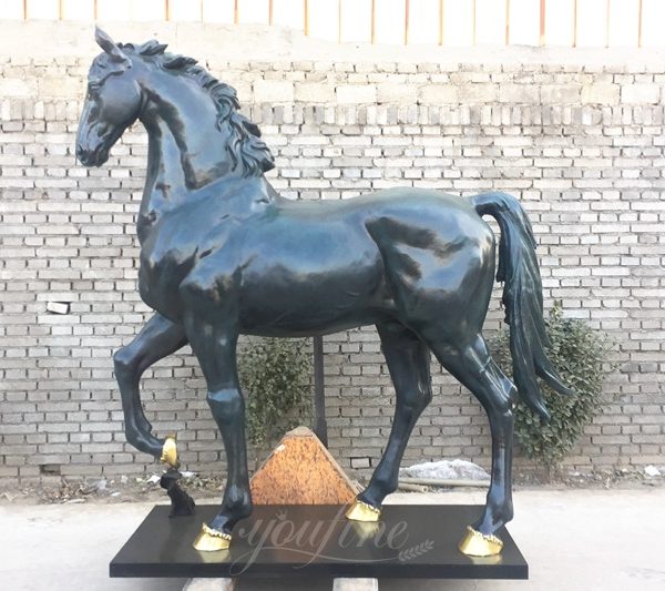 green horse statue