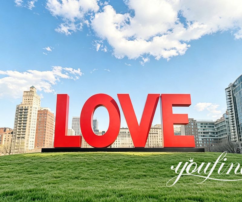 red metal love letter sculpture