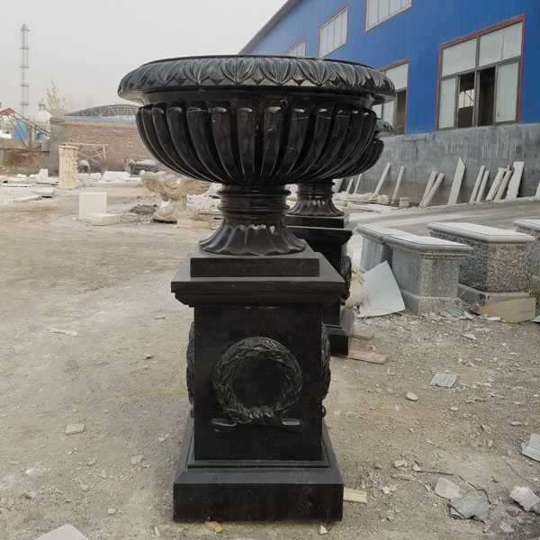 https://www.cnstatue.com/wp-content/uploads/2018/05/Cheap-Black-Marble-Outdoor-Flower-Pot-On-Stock-For-Garden-Decor-For-Sale.jpg