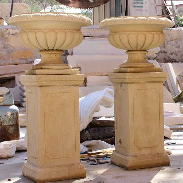 https://www.cnstatue.com/wp-content/uploads/2018/05/Cheap-Yellow-Marble-Outdoor-Flower-Pot-On-Stock-For-Garden-Decor-For-Sale.jpg