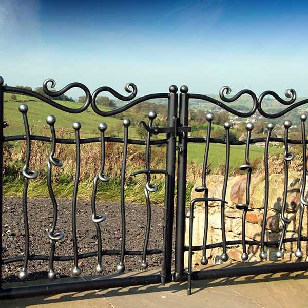 Cheap small farm casting iron swing driveway gate design for sale–IOK-196