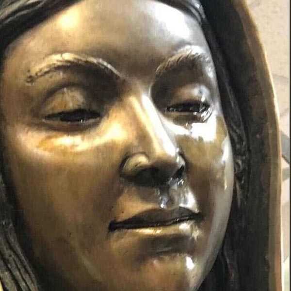 Virgin Mary statue of American is crying?