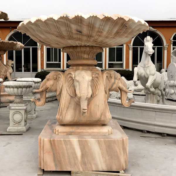 Custom made life size yellow marble outdoor fountain with elephants for sale on stock