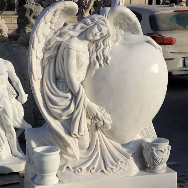 Grief angel with heart marble headstone monuments designs for sale .