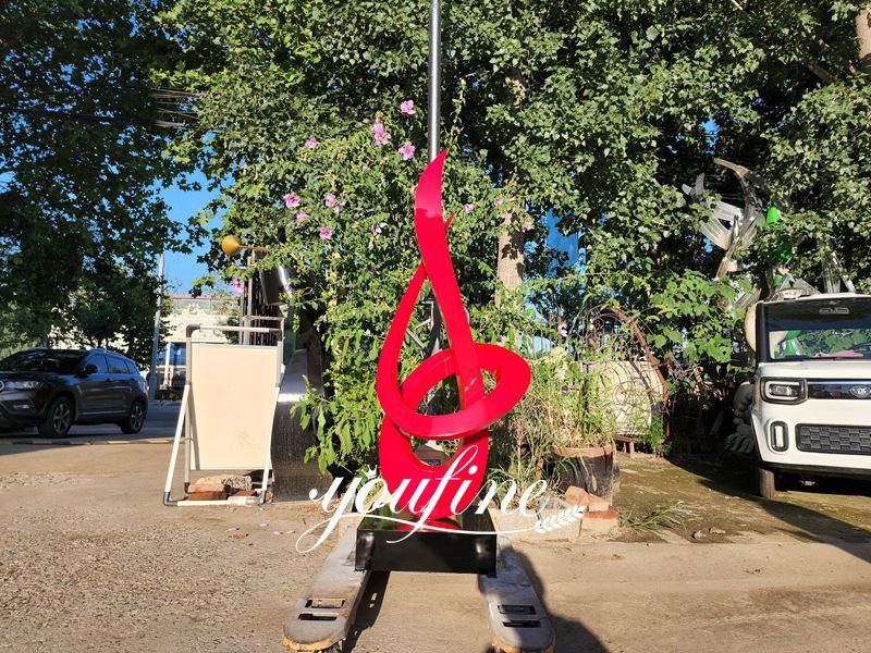 red stainless steel abstract growth sculpture