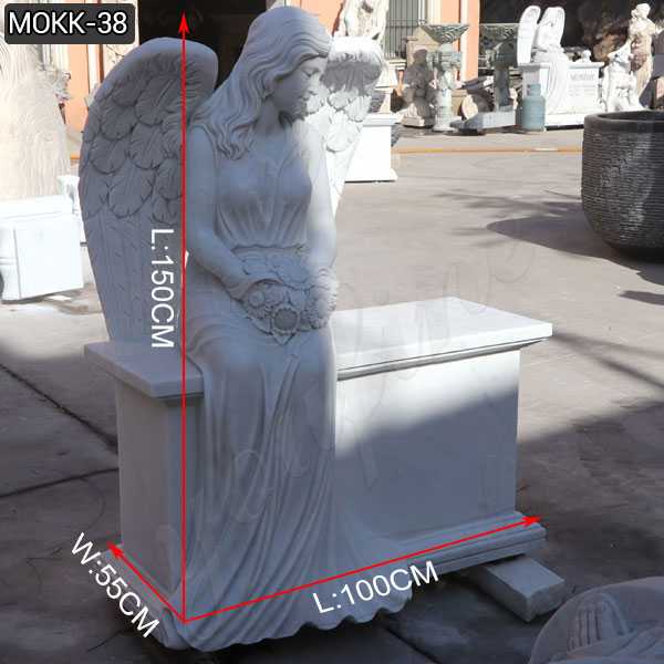 White marble angel tombstone