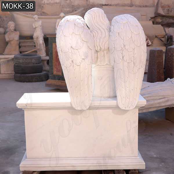 White marble angel tombstone