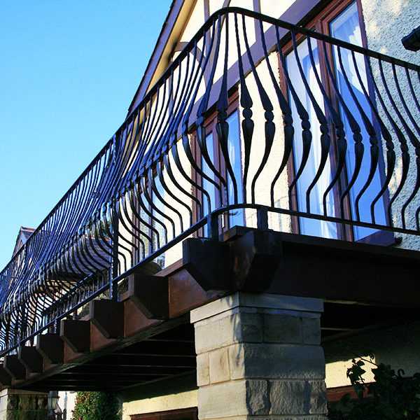 Popular outdoor curved edge wrought iron balcony fence designs for sale from ironwork factory China–IOK-149