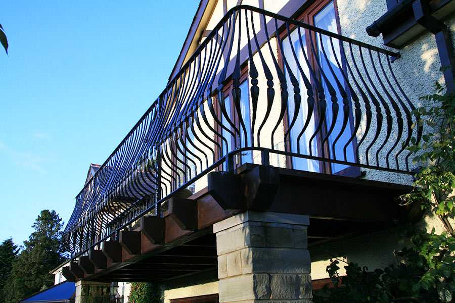 Popular outdoor curved edge wrought iron balcony fence designs for sale from ironwork factory China--IOK-149