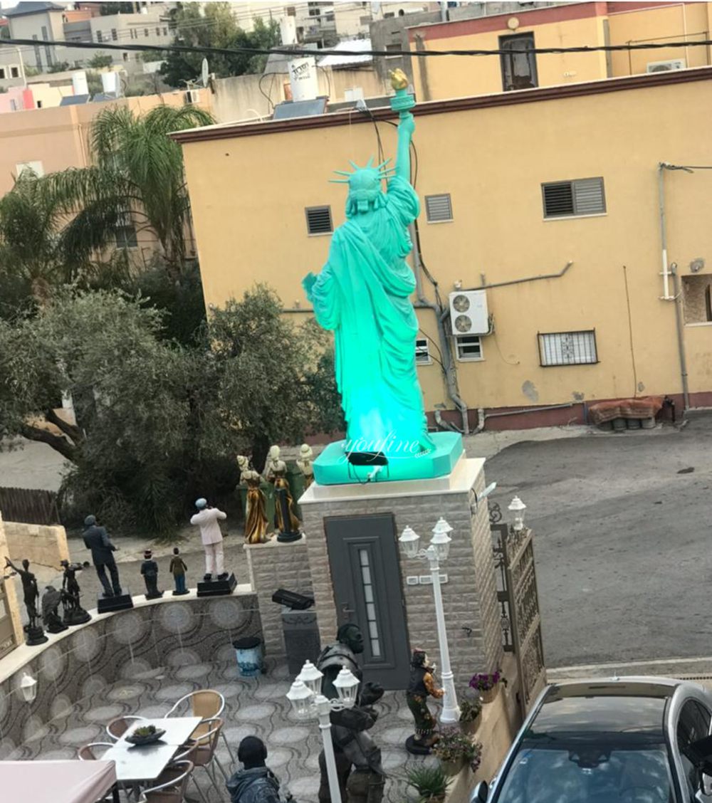 Our client placed this sculpture atop a pillar at the garage exit.