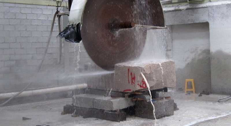 cutting the white marble