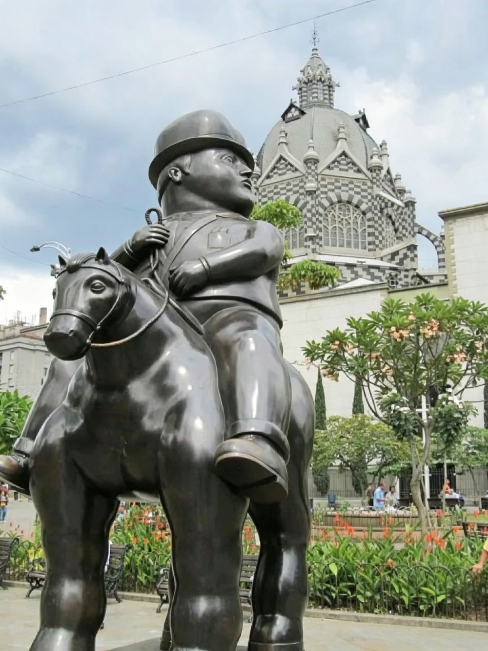 fat Man on a Horse Statue