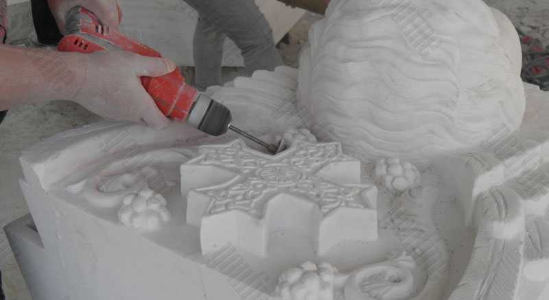 polishing the marble statue
