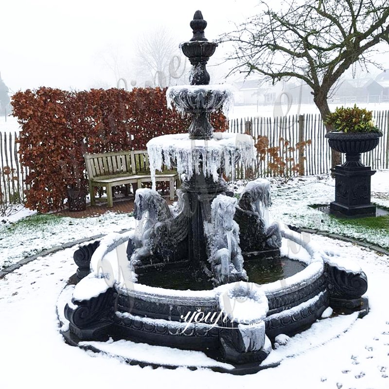 large black horse outdoor fountain