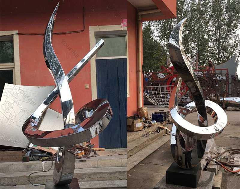 modern abstract stainless sculpture outside for sale