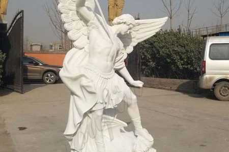 white marble St Michael statues