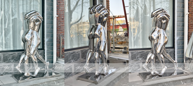 finished stainless steel hand sculpture