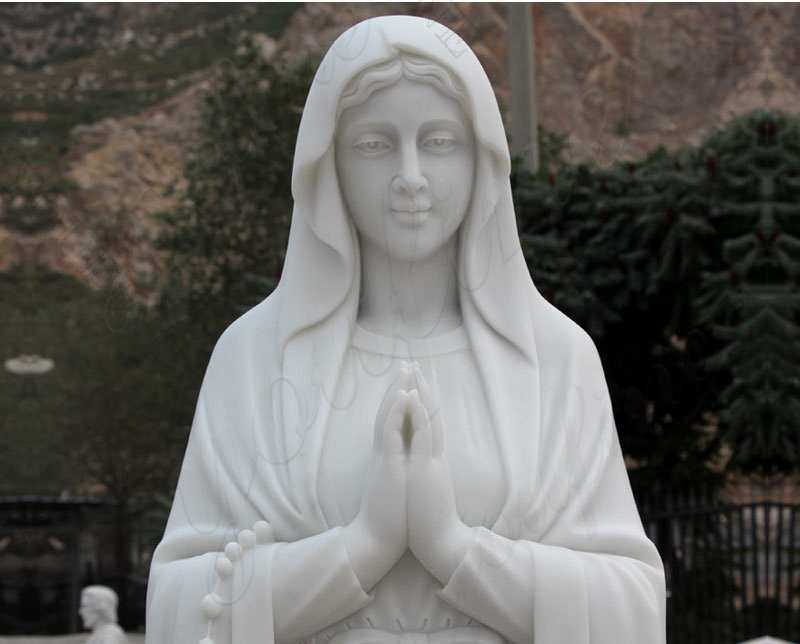 white marble our lady of lourdes statue