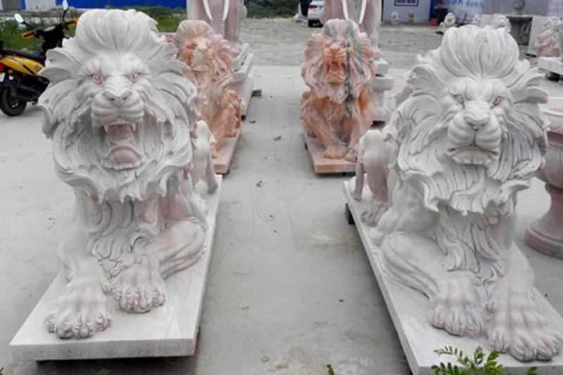 Life size entrance paired white marble lying and roaring lion statues