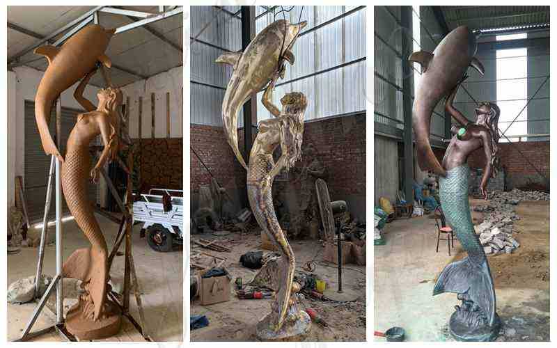 large bronze mermaid statue