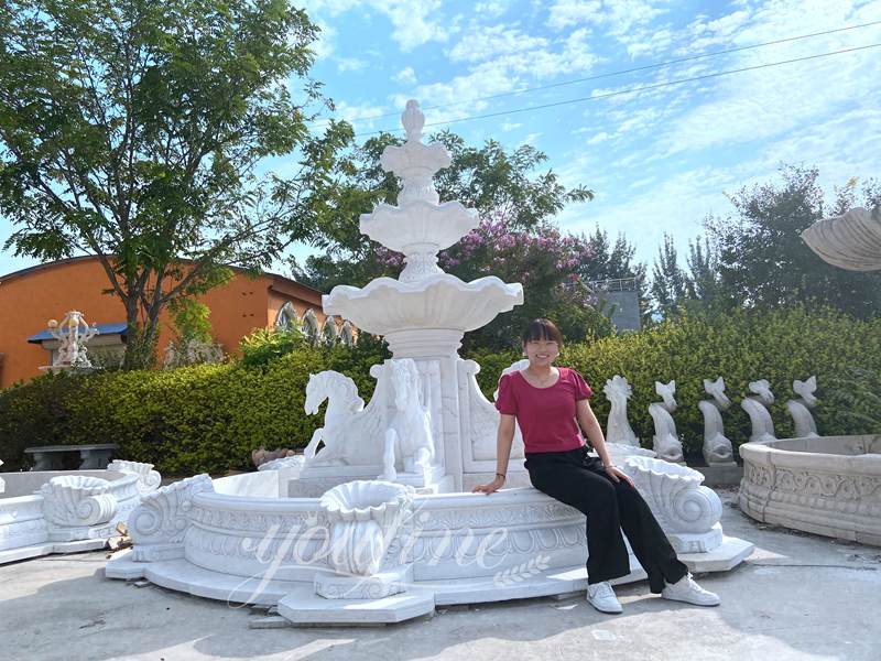 white marble water feature
