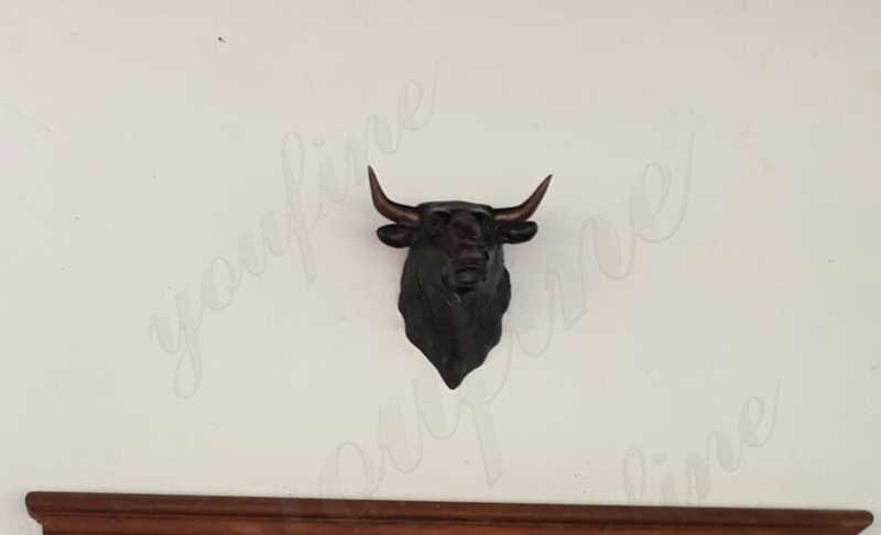 Bronze bull head sculpture