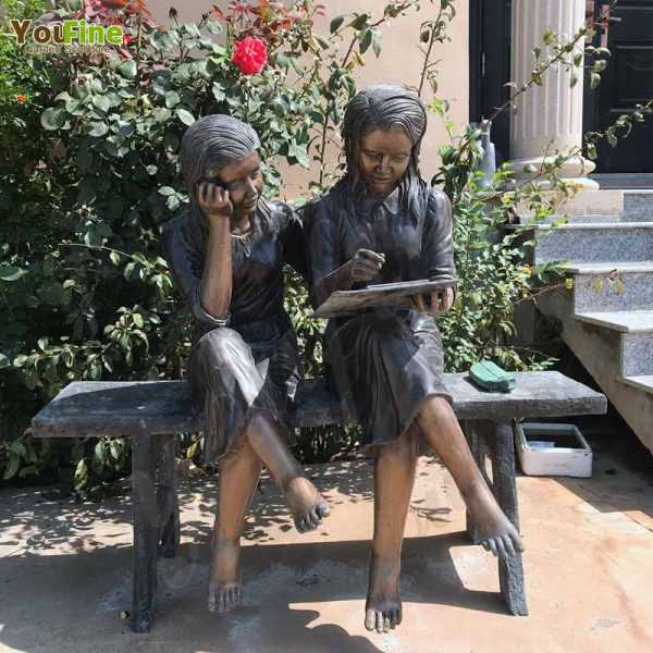 Lovely Bronze Sisters Reading Sculpture for Sale