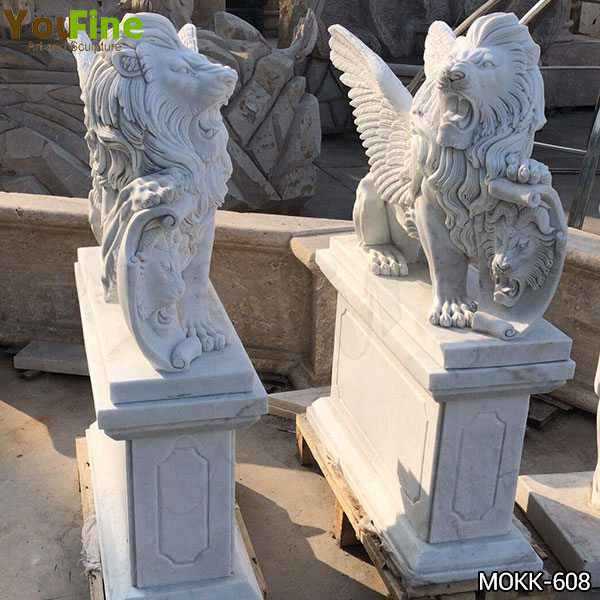 Antique Style White Marble Winged Lion Statues