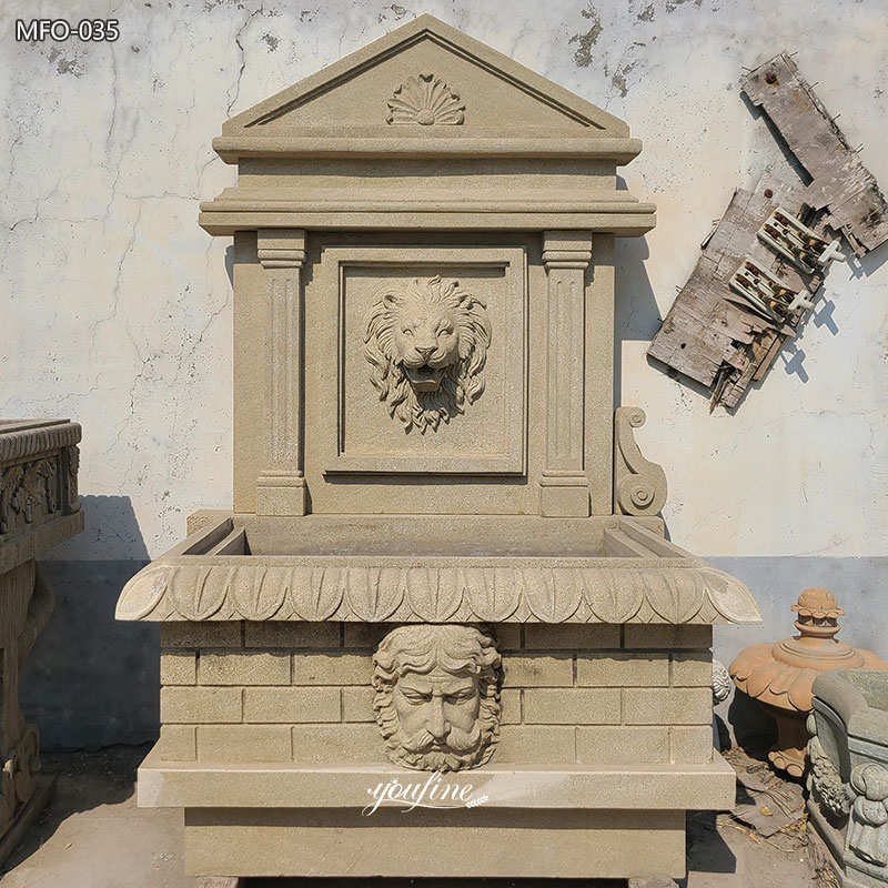 outdoor limestone wall fountain