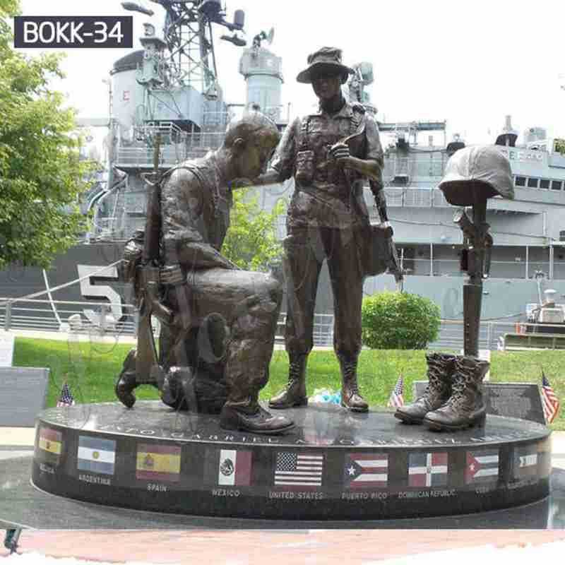 soldier kneeling at cross statue