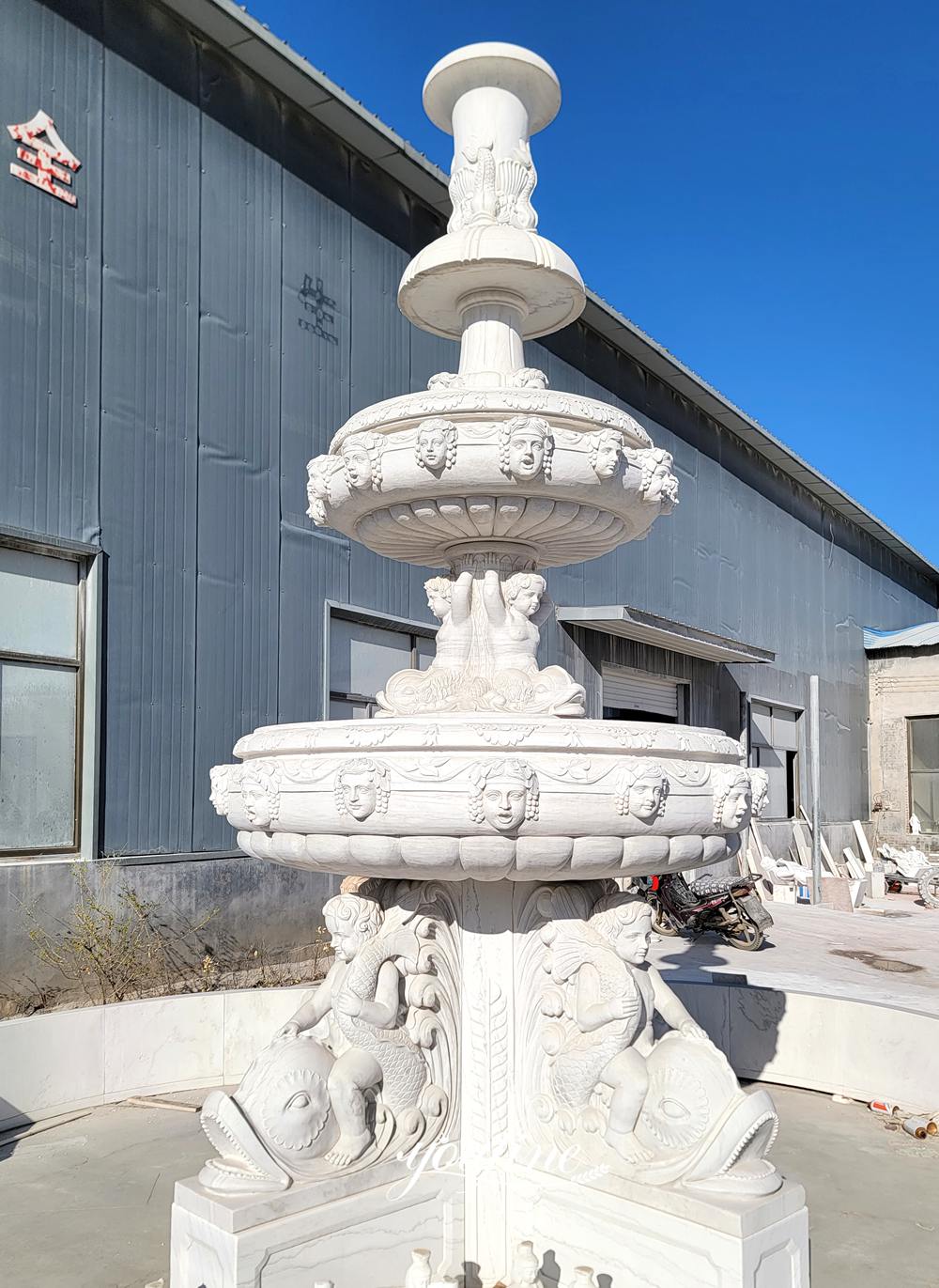 white Marble Children and Fish Statue Fountain detail