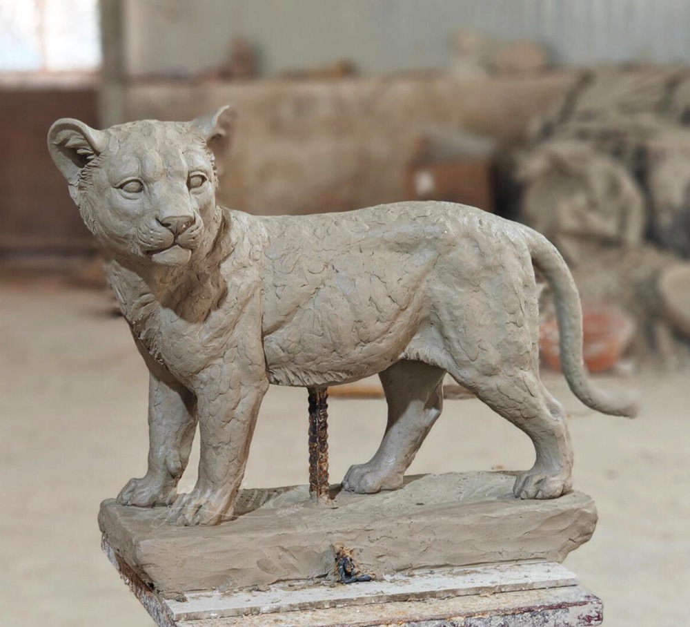 Clay model of cubs statue
