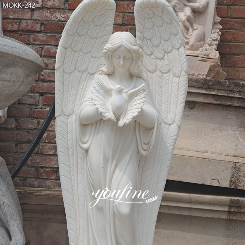 Estatua de ángel de mármol con escultura de paloma para decoración de jardín y monumentos.