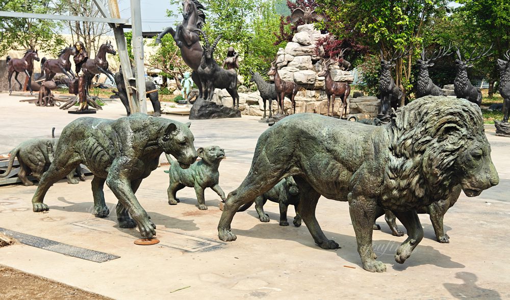 Realistic walking bronze lion family sculpture